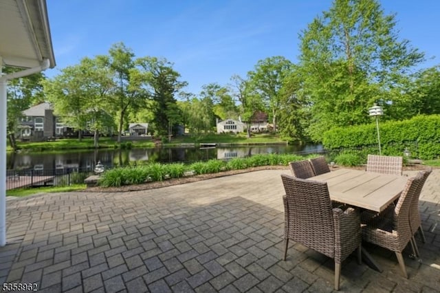 7 Dells Dr, Denville Twp, NJ 07834 - view of patio / terrace featuring a water view and outdoor dining space