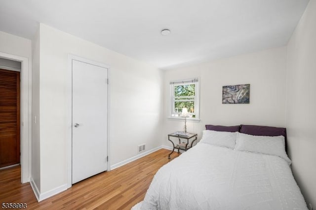 110 William St, Clark Twp, NJ 07066 - bedroom featuring light wood-style flooring and baseboards
