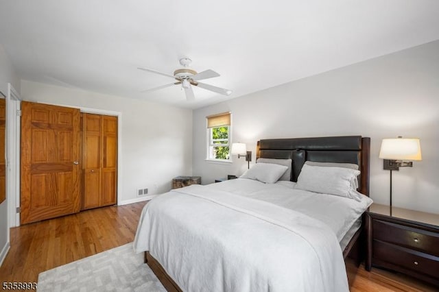 110 William St, Clark Twp, NJ 07066 - bedroom with wood finished floors, a ceiling fan, and baseboards