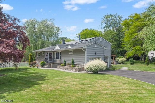 110 William St, Clark Twp, NJ 07066 - view of front of home with a chimney and covered porch