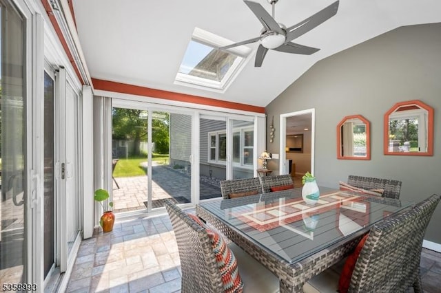 110 William St, Clark Twp, NJ 07066 - sunroom with lofted ceiling, stone tile flooring, and a skylight