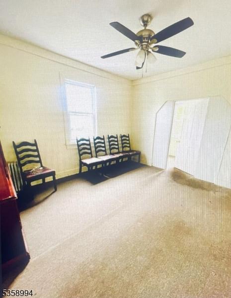 61 Thornall St, Carteret Boro, NJ 07008 - sitting room with carpet and ceiling fan