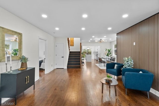 22 Race St, Nutley Twp, NJ 07110 - living room with stairway, recessed lighting, wood finished floors, a chandelier, and baseboards