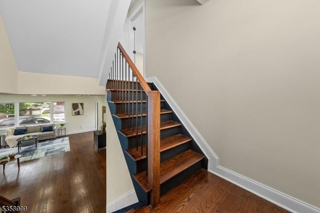 22 Race St, Nutley Twp, NJ 07110 - stairs with wood finished floors, baseboards, and high vaulted ceiling