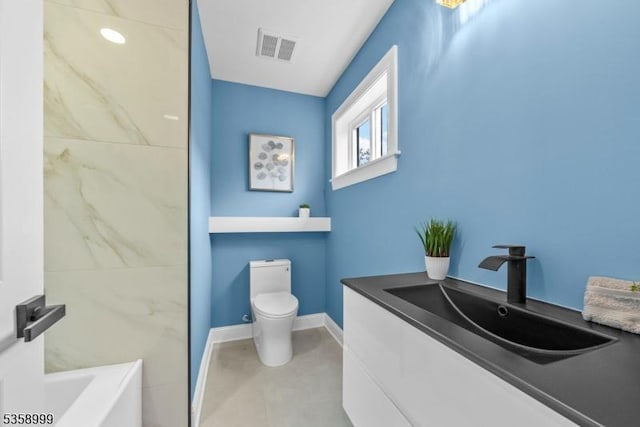 22 Race St, Nutley Twp, NJ 07110 - bathroom featuring toilet, baseboards, a tub to relax in, and vanity