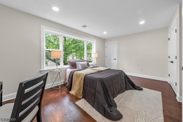 22 Race St, Nutley Twp, NJ 07110 - bedroom with baseboards, dark wood-type flooring, and recessed lighting