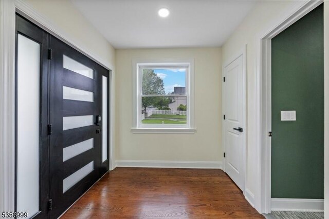 22 Race St, Nutley Twp, NJ 07110 - foyer featuring dark wood-style flooring, baseboards, and recessed lighting