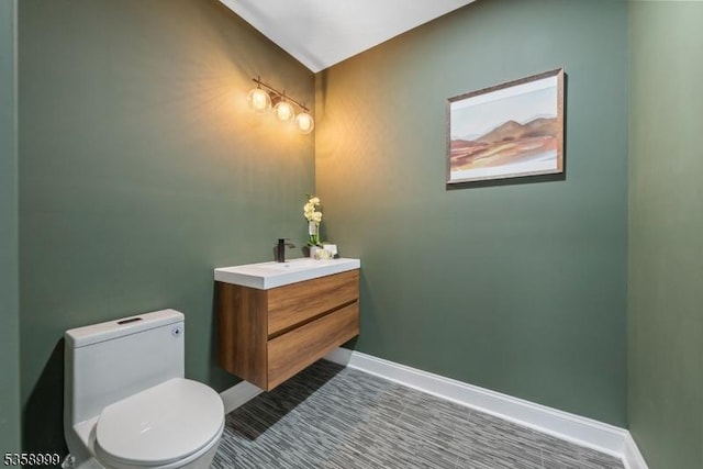 22 Race St, Nutley Twp, NJ 07110 - bathroom featuring toilet, vanity, and baseboards