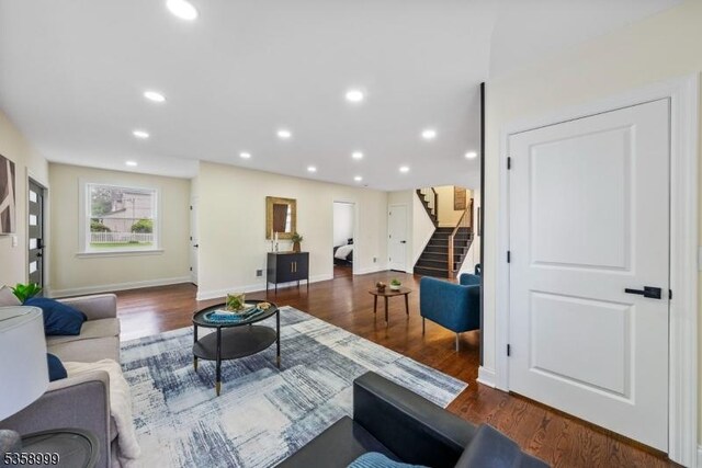 22 Race St, Nutley Twp, NJ 07110 - living room with stairway, wood finished floors, recessed lighting, and baseboards