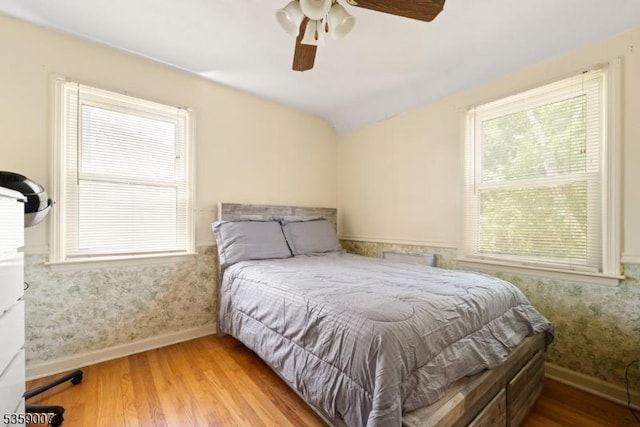 580 Mountainview Dr, North Plainfield Boro, NJ 07063 - bedroom featuring baseboards, wood finished floors, multiple windows, and lofted ceiling