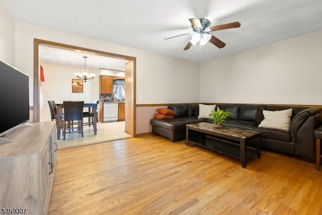 580 Mountainview Dr, North Plainfield Boro, NJ 07063 - living area featuring light wood finished floors, a chandelier, and a ceiling fan