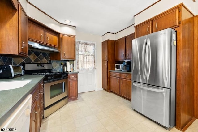 580 Mountainview Dr, North Plainfield Boro, NJ 07063 - kitchen featuring appliances with stainless steel finishes, under cabinet range hood, light floors, backsplash, and dark countertops