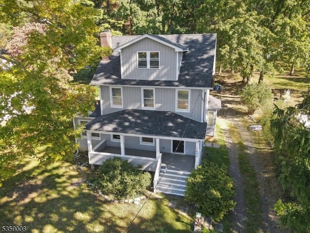 1899 Washington Valley Rd, Bridgewater Twp, NJ 08836 - back of house featuring a chimney, a wooden deck, and roof with shingles
