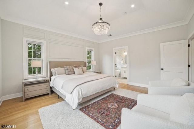 84 Elmwood Ave, Chatham Boro, NJ 07928 - bedroom featuring ornamental molding, a chandelier, light wood-style floors, baseboards, and connected bathroom