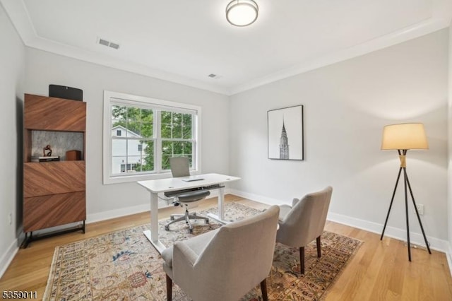 84 Elmwood Ave, Chatham Boro, NJ 07928 - office area with light wood-style floors, crown molding, and baseboards