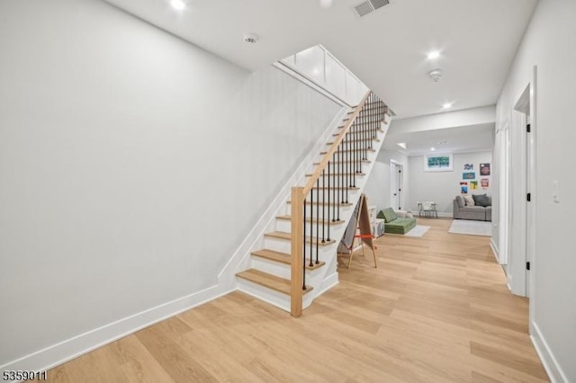 84 Elmwood Ave, Chatham Boro, NJ 07928 - stairs with wood finished floors, recessed lighting, and baseboards
