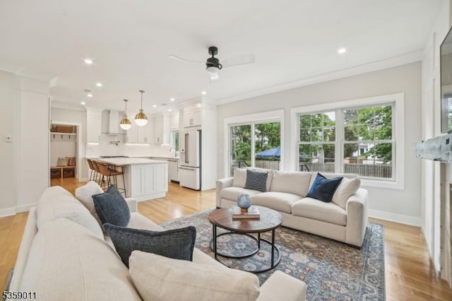 84 Elmwood Ave, Chatham Boro, NJ 07928 - living area with crown molding, light wood-style flooring, baseboards, ceiling fan, and recessed lighting