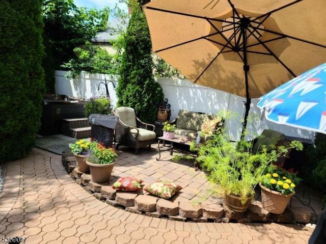37 Furber Ave, Linden City, NJ 07036 - view of patio / terrace with a hot tub and an outdoor living space