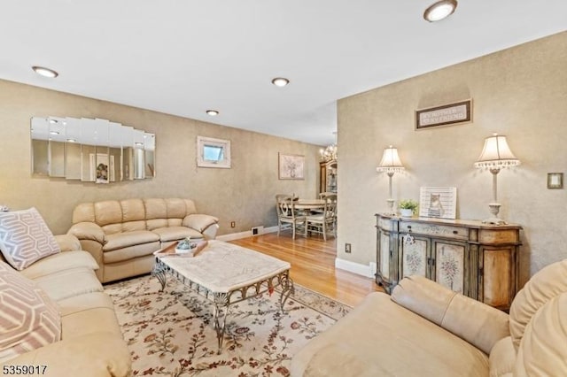 37 Furber Ave, Linden City, NJ 07036 - living area featuring light wood-style floors, a chandelier, and recessed lighting