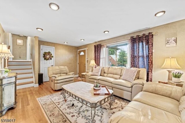 37 Furber Ave, Linden City, NJ 07036 - living room with light wood-style floors, recessed lighting, and stairs