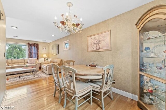 37 Furber Ave, Linden City, NJ 07036 - dining room featuring wood finished floors, a chandelier, and recessed lighting