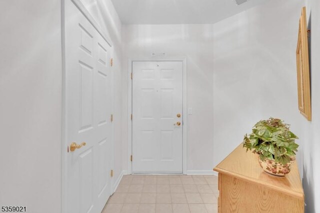 7013 Brookfield Glen Dr, White Twp, NJ 07823 - entryway featuring baseboards and light tile patterned floors