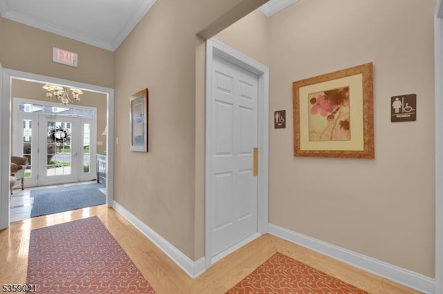 7013 Brookfield Glen Dr, White Twp, NJ 07823 - entrance foyer featuring ornamental molding, a chandelier, and light wood-style floors