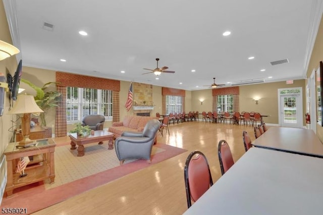 7013 Brookfield Glen Dr, White Twp, NJ 07823 - living area with ceiling fan, recessed lighting, wood finished floors, healthy amount of natural light, and crown molding