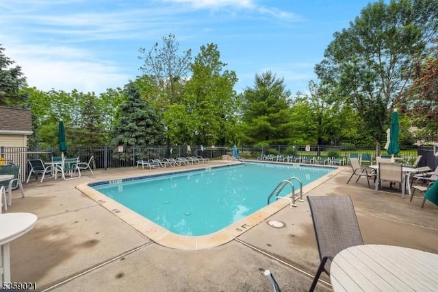 7013 Brookfield Glen Dr, White Twp, NJ 07823 - community pool with a patio area, outdoor dining area, and view of scattered trees