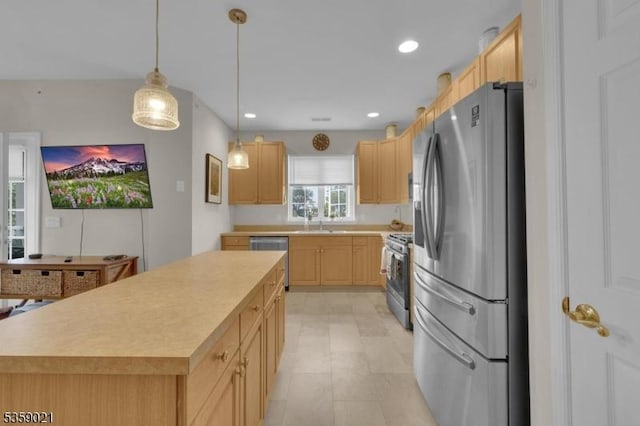7013 Brookfield Glen Dr, White Twp, NJ 07823 - kitchen featuring appliances with stainless steel finishes, light brown cabinetry, light countertops, a center island, and recessed lighting