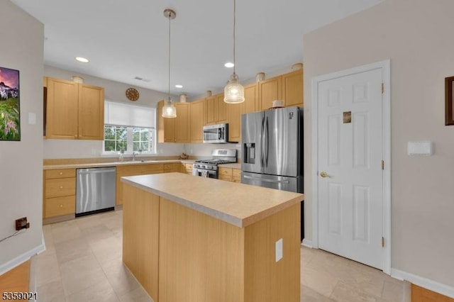 7013 Brookfield Glen Dr, White Twp, NJ 07823 - kitchen featuring appliances with stainless steel finishes, light brown cabinetry, light countertops, a kitchen island, and pendant lighting