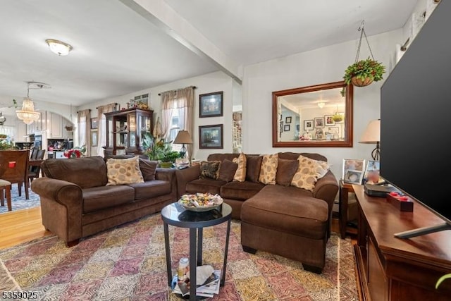 263 Morningside Ave, Cliffside Park Boro, NJ 07010 - living room with a chandelier and wood finished floors