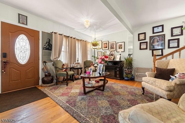 263 Morningside Ave, Cliffside Park Boro, NJ 07010 - living area with wood finished floors, a chandelier, and stairway