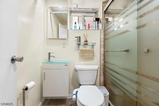 263 Morningside Ave, Cliffside Park Boro, NJ 07010 - bathroom featuring a shower stall, toilet, baseboards, and vanity