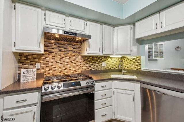 25 Manor Dr, Hillsborough Twp, NJ 08844 - kitchen with appliances with stainless steel finishes, a sink, under cabinet range hood, white cabinetry, and dark countertops