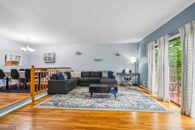 25 Manor Dr, Hillsborough Twp, NJ 08844 - living room featuring a chandelier and wood finished floors