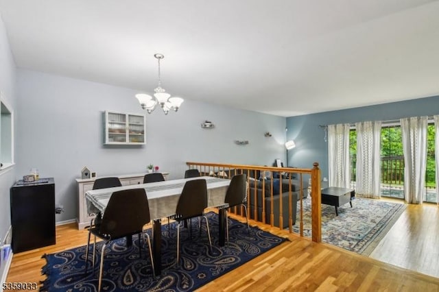 25 Manor Dr, Hillsborough Twp, NJ 08844 - dining room featuring a chandelier and wood finished floors