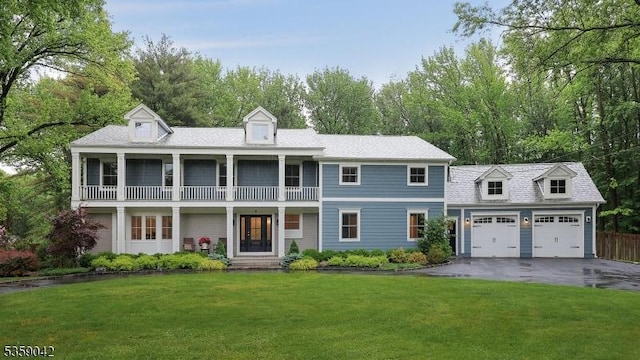 6 Balfour Ln, Scotch Plains Twp, NJ 07076 - view of front of property with a balcony, a garage, a front yard, and driveway