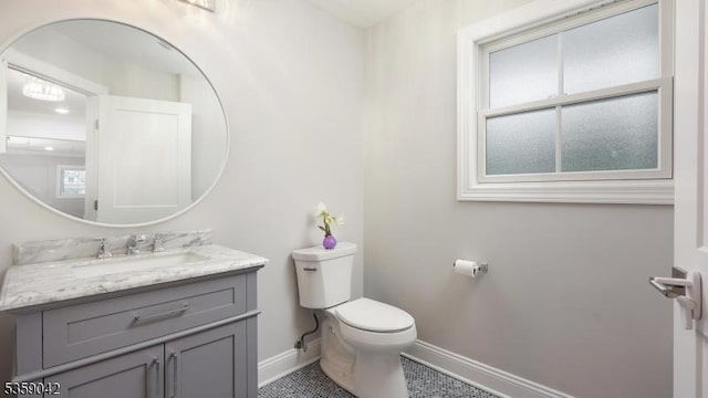 6 Balfour Ln, Scotch Plains Twp, NJ 07076 - bathroom featuring baseboards, toilet, vanity, and tile patterned floors