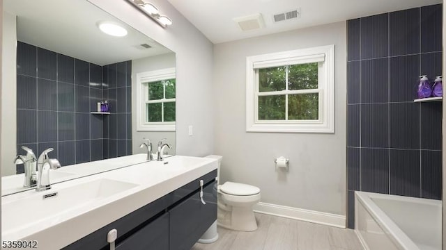 6 Balfour Ln, Scotch Plains Twp, NJ 07076 - bathroom with plenty of natural light, baseboards, double vanity, and toilet