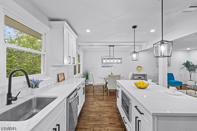 192 Mohawk Trl, Wayne Twp, NJ 07470 - kitchen with a sink, stainless steel appliances, white cabinets, dark wood-style flooring, and recessed lighting