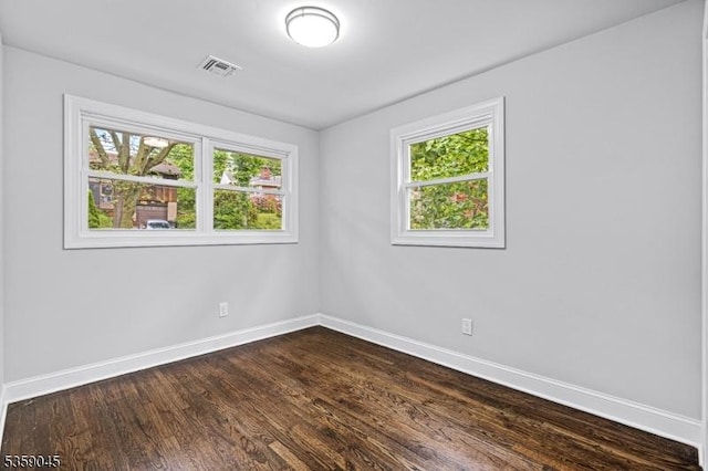 192 Mohawk Trl, Wayne Twp, NJ 07470 - unfurnished room featuring baseboards and dark wood-type flooring