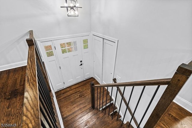 192 Mohawk Trl, Wayne Twp, NJ 07470 - entryway with dark wood-style flooring, a chandelier, stairs, and a high ceiling