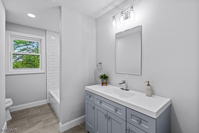 192 Mohawk Trl, Wayne Twp, NJ 07470 - full bath featuring vanity, toilet, and baseboards
