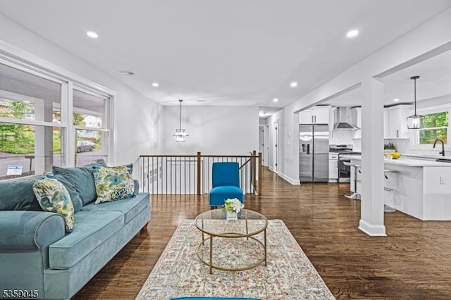 192 Mohawk Trl, Wayne Twp, NJ 07470 - living area featuring recessed lighting, dark wood finished floors, and a chandelier