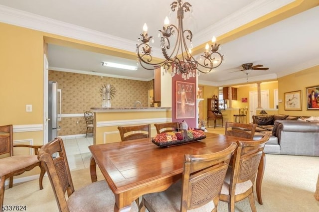 2307 Ambassador Ct Unit 2307, Franklin Twp, NJ 08873 - dining space with ornamental molding, ceiling fan, wallpapered walls, a chandelier, and light colored carpet