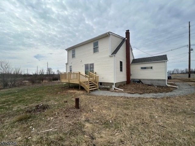 715 Pittstown Rd, Franklin Twp, NJ 08825 - rear view of property featuring a chimney and a deck