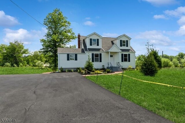 715 Pittstown Rd, Franklin Twp, NJ 08825 - view of front facade featuring a chimney, a front yard, and roof with shingles