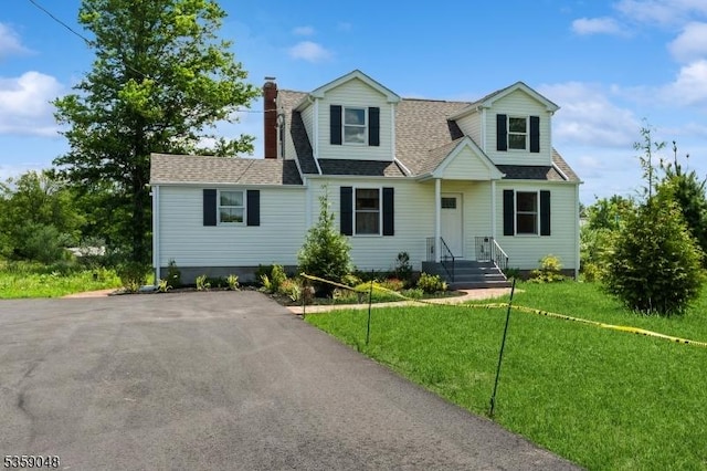 715 Pittstown Rd, Franklin Twp, NJ 08825 - view of front of house with a chimney, a front yard, and a shingled roof
