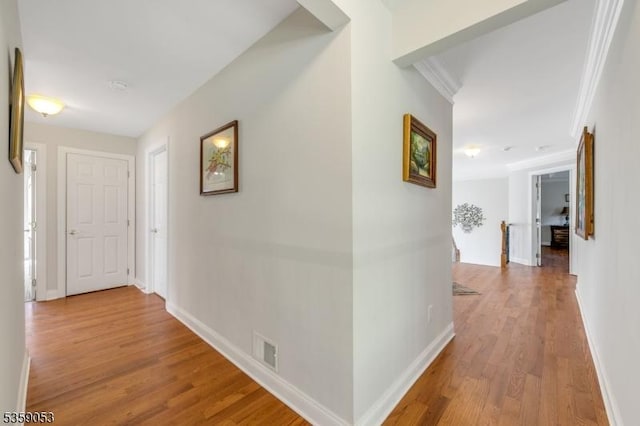 4 Greenbriar Ct, Mount Olive Twp, NJ 07836 - hall with wood finished floors, baseboards, and crown molding